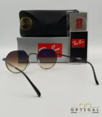 Lunettes de soleil Ray-Ban Jack RB3565 grises métalliques avec verres dégradés marrons, étui noir, boîte d'origine et livret de garantie chez Optical Gallery.