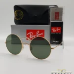 Lunettes de soleil Ray-Ban Jaio RB3592 dorées à grands verres ronds verts G-15, étui noir, boîte grise et livret de garantie chez Optical Gallery.