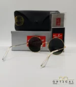 Lunettes de soleil Ray-Ban Jaio RB3592 dorées à grands verres ronds verts G-15, étui noir, boîte grise et livret de garantie chez Optical Gallery.