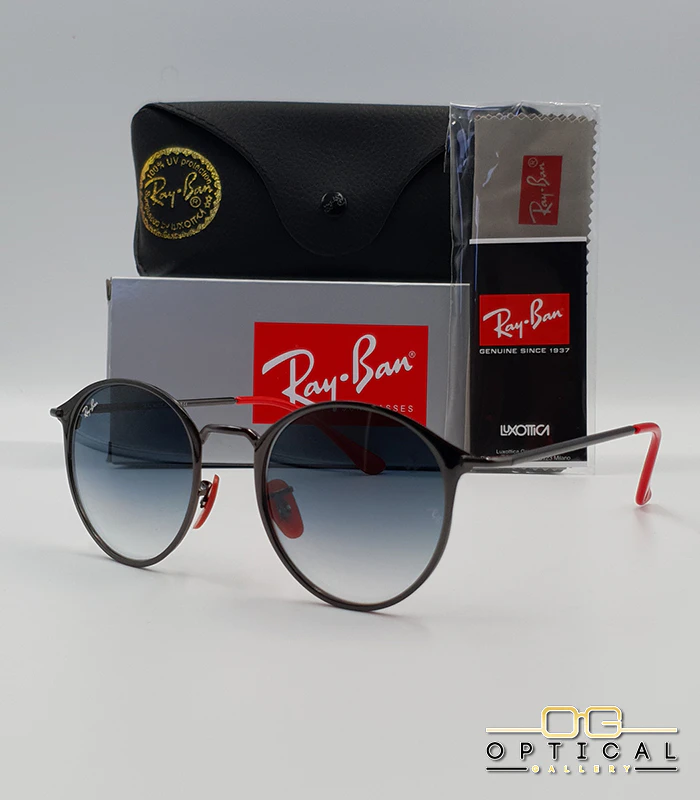 lunettes-de-soleil-ray-ban-ferrari-rb3602m-gris-bleu-degrade-optical-gallery Lunettes de soleil Ray-Ban Scuderia Ferrari RB3602M gris anthracite métallique avec verres dégradés bleus, étui noir, boîte grise et livret de garantie chez Optical Gallery.