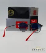 Lunettes de soleil Ray-Ban Scuderia Ferrari RB3602M gris anthracite métallique avec verres dégradés bleus, étui noir, boîte grise et livret de garantie chez Optical Gallery.