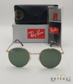 Lunettes de soleil Ray-Ban New Round RB3637 dorées avec verres verts G-15, étui noir, boîte grise et livret de garantie chez Optical Gallery.