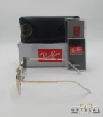 Lunettes de soleil Ray-Ban New Round RB3637 dorées avec verres dégradés bleus gris, étui noir, boîte grise et livret de garantie chez Optical Gallery.