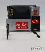 Lunettes de soleil Ray-Ban Round Double Bridge RB3647N noires avec cerclages en acétate noir et verres dégradés bleus gris, étui noir, boîte grise et livret de garantie chez Optical Gallery.
