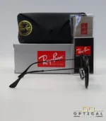 Lunettes de soleil Ray-Ban Round Double Bridge RB3647N noires avec cerclages en acétate noir et verres dégradés bleus gris, étui noir, boîte grise et livret de garantie chez Optical Gallery.
