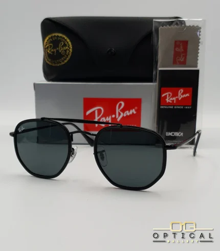 Lunettes de soleil Ray-Ban Marshal II RB3648M noires avec cerclages en acétate noir et verres verts G-15, étui noir, boîte grise et livret de garantie chez Optical Gallery.