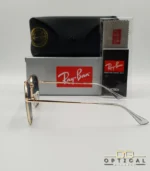 Lunettes de soleil Ray-Ban Marshal II RB3648M dorées avec cerclages en acétate transparent et verres dégradés bleus gris, étui noir, boîte grise et livret de garantie chez Optical Gallery.