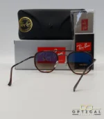 Lunettes de soleil Ray-Ban Marshal II RB3648M marrons avec cerclages en acétate marron et verres dégradés marrons, étui noir, boîte grise et livret de garantie chez Optical Gallery.