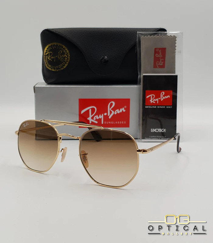 lunettes-de-soleil-ray-ban-marshal-ii-rb3648m-or-marron-degrade-optical-gallery Lunettes de soleil Ray-Ban Marshal II RB3648M dorées avec verres dégradés marrons, étui noir, boîte grise et livret de garantie chez Optical Gallery.