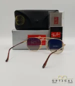 Lunettes de soleil Ray-Ban Marshal II RB3648M dorées avec verres dégradés marrons, étui noir, boîte grise et livret de garantie chez Optical Gallery.