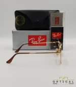 Lunettes de soleil Ray-Ban Marshal II RB3648M dorées avec verres dégradés marrons, étui noir, boîte grise et livret de garantie chez Optical Gallery.