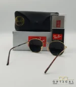Lunettes de soleil Ray-Ban Julie RB3772 dorées avec verres verts G-15, étui noir, boîte grise et livret de garantie chez Optical Gallery.
