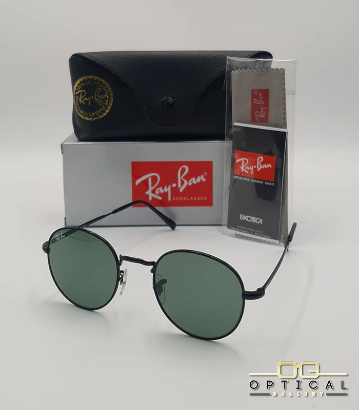 lunettes-de-soleil-ray-ban-round-metal-rb3447-noir-vert-g15-optical-gallery Lunettes de soleil Ray-Ban Round Metal RB3447 noires avec verres verts G-15, étui noir, boîte grise et livret de garantie chez Optical Gallery.