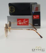 Lunettes de soleil Ray-Ban Julie RB3772 dorées avec verres dégradés marrons, étui noir, boîte grise et livret de garantie chez Optical Gallery.