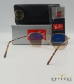Lunettes de soleil Ray-Ban Julie RB3772 dorées avec verres dégradés marrons, étui noir, boîte grise et livret de garantie chez Optical Gallery.