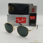Lunettes de soleil Ray-Ban Julie RB3772 dorées avec verres verts G-15, étui noir, boîte grise et livret de garantie chez Optical Gallery.