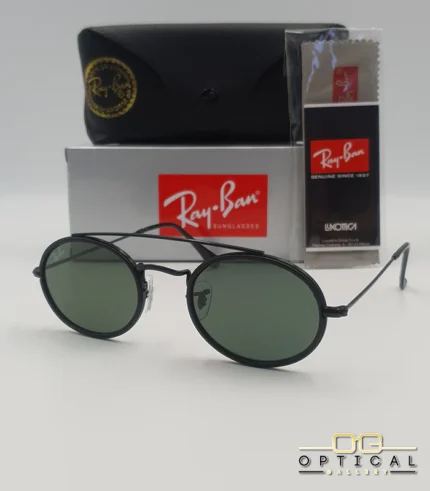 Lunettes de soleil Ray-Ban Round Double Bridge RB3847N noires avec cerclages en acétate noir et verres verts G-15, étui noir, boîte grise et livret de garantie chez Optical Gallery.