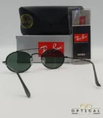 Lunettes de soleil Ray-Ban Round Double Bridge RB3847N noires avec cerclages en acétate noir et verres verts G-15, étui noir, boîte grise et livret de garantie chez Optical Gallery.