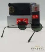 Lunettes de soleil Ray-Ban Round Double Bridge RB3847N noires avec cerclages en acétate noir et verres verts G-15, étui noir, boîte grise et livret de garantie chez Optical Gallery.