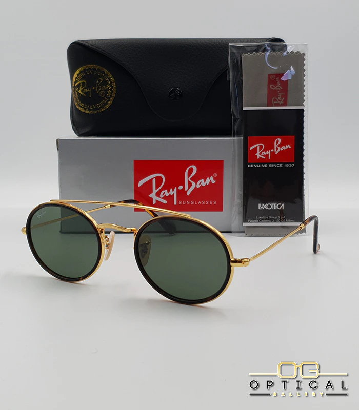 lunettes-de-soleil-ray-ban-round-double-bridge-rb3847n-or-ecaille-vert-g15-optical-gallery Lunettes de soleil Ray-Ban Round Double Bridge RB3847N dorées avec cerclages en acétate écaille de tortue et verres verts G-15, étui noir, boîte grise et livret de garantie chez Optical Gallery.