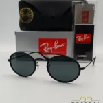 Lunettes de soleil Ray-Ban Round Double Bridge RB3847N noires avec cerclages en acétate noir et verres dégradés bleus gris, étui noir, boîte grise et livret de garantie chez Optical Gallery.