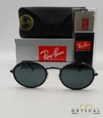 Lunettes de soleil Ray-Ban Round Double Bridge RB3847N noires avec cerclages en acétate noir et verres dégradés bleus gris, étui noir, boîte grise et livret de garantie chez Optical Gallery.